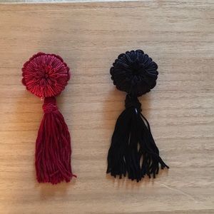 Red and navy tassel brooches